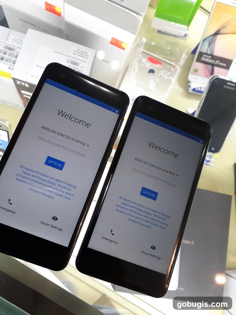 Two phones displaying welcome screen