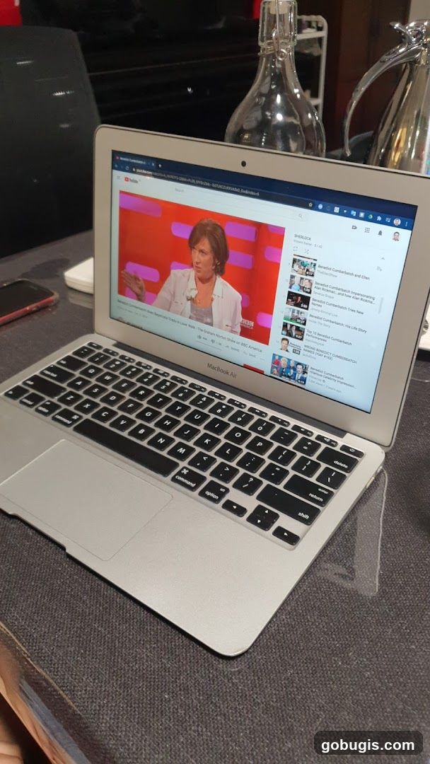 Laptop displaying YouTube video
