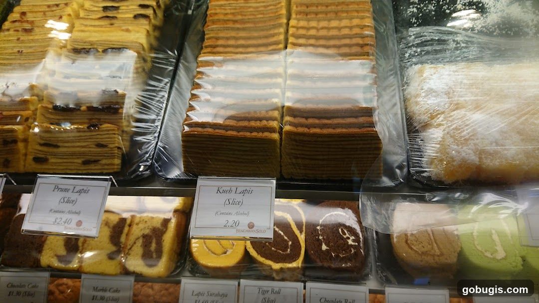 Assortment of Layer Cakes and Rolls