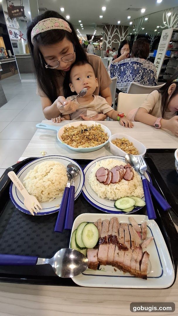 Family Meal at a Food Court