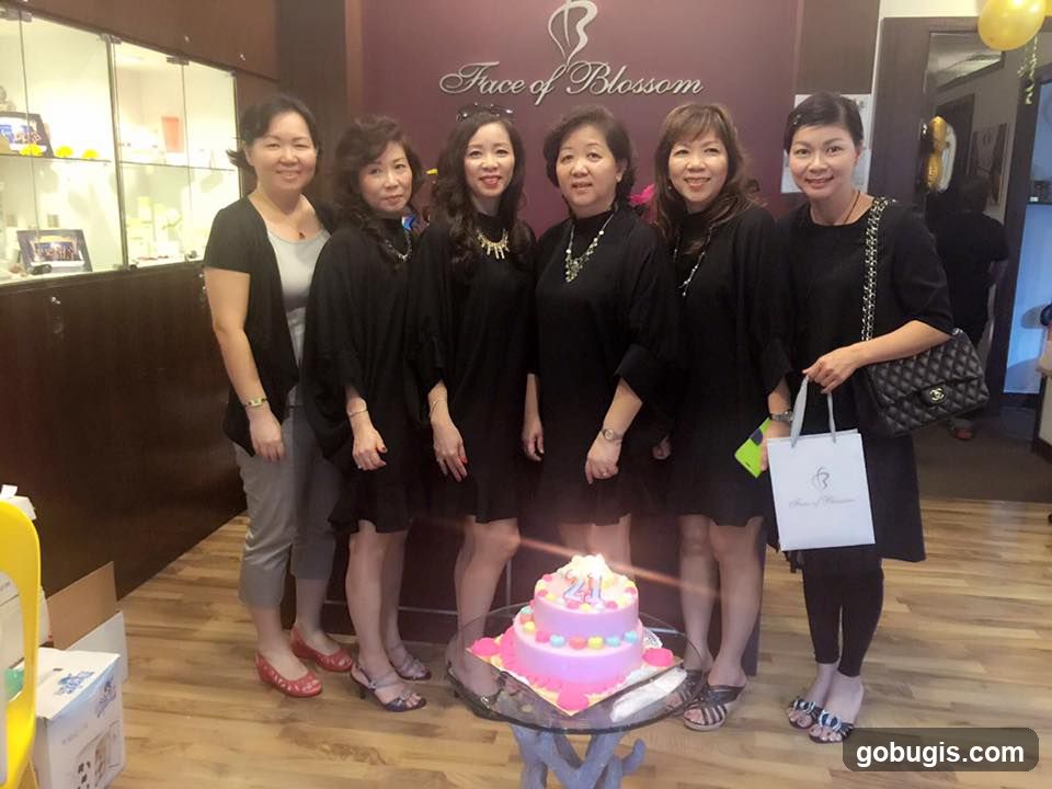 Group of women with a cake