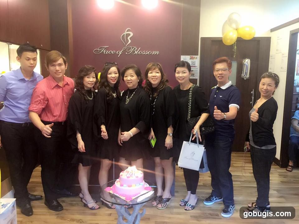 Group celebrating with a cake
