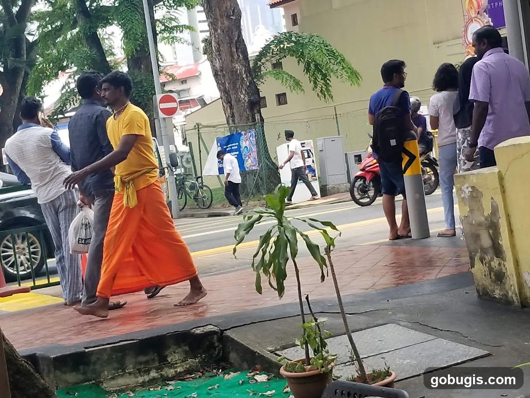 People walking on a sidewalk
