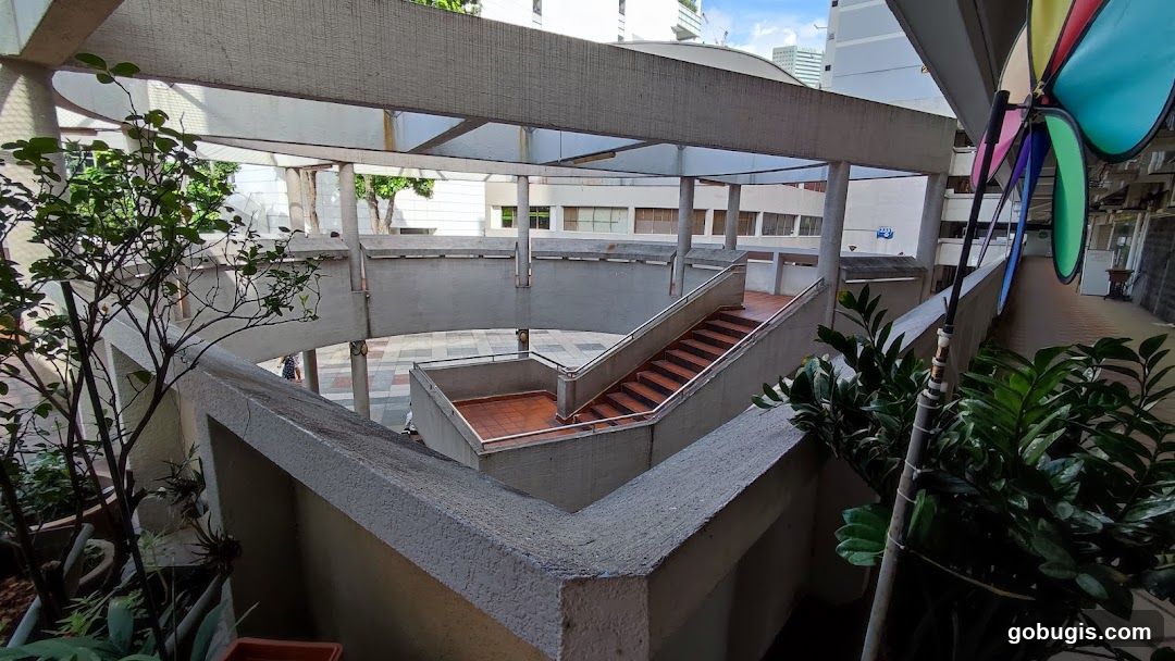 Outdoor walkway with stairs and plants