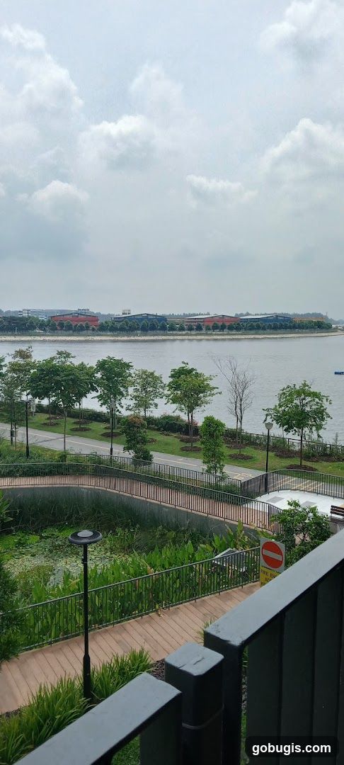 Waterfront park with buildings in the distance