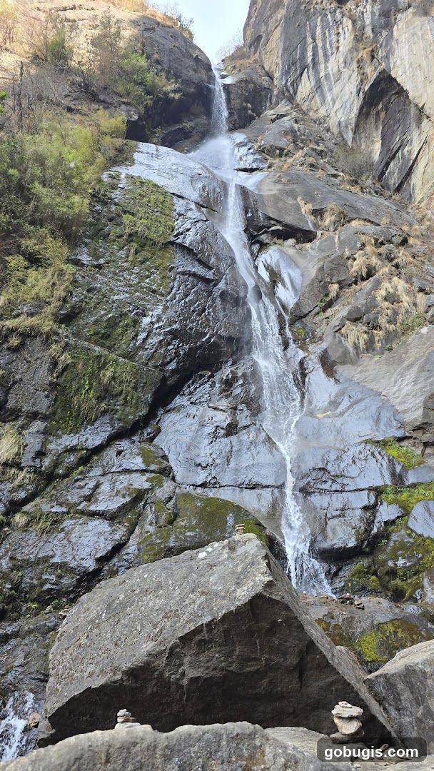 Waterfall cascading down a rocky cliff