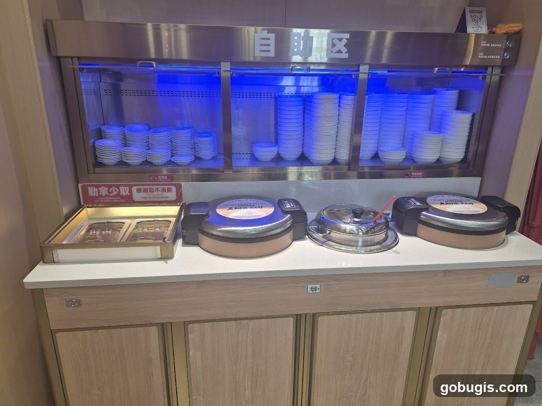Buffet Station with Plates and Food Warmers