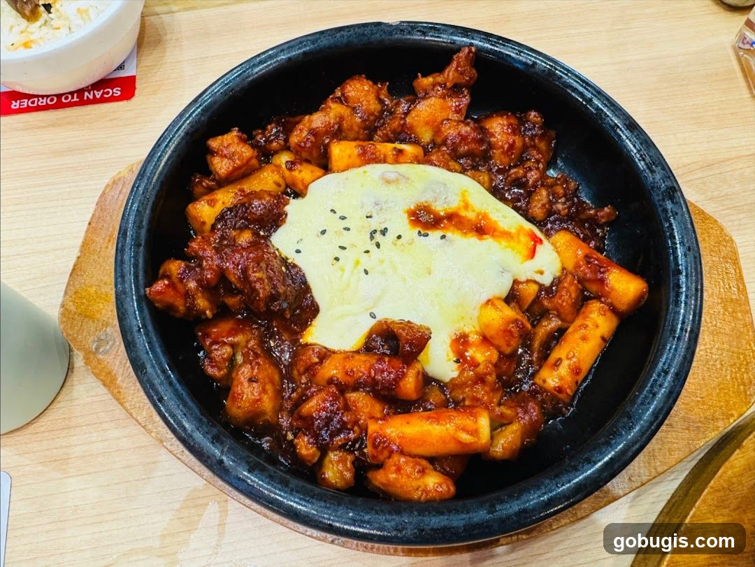 Spicy Chicken and Rice Cakes with Cheese