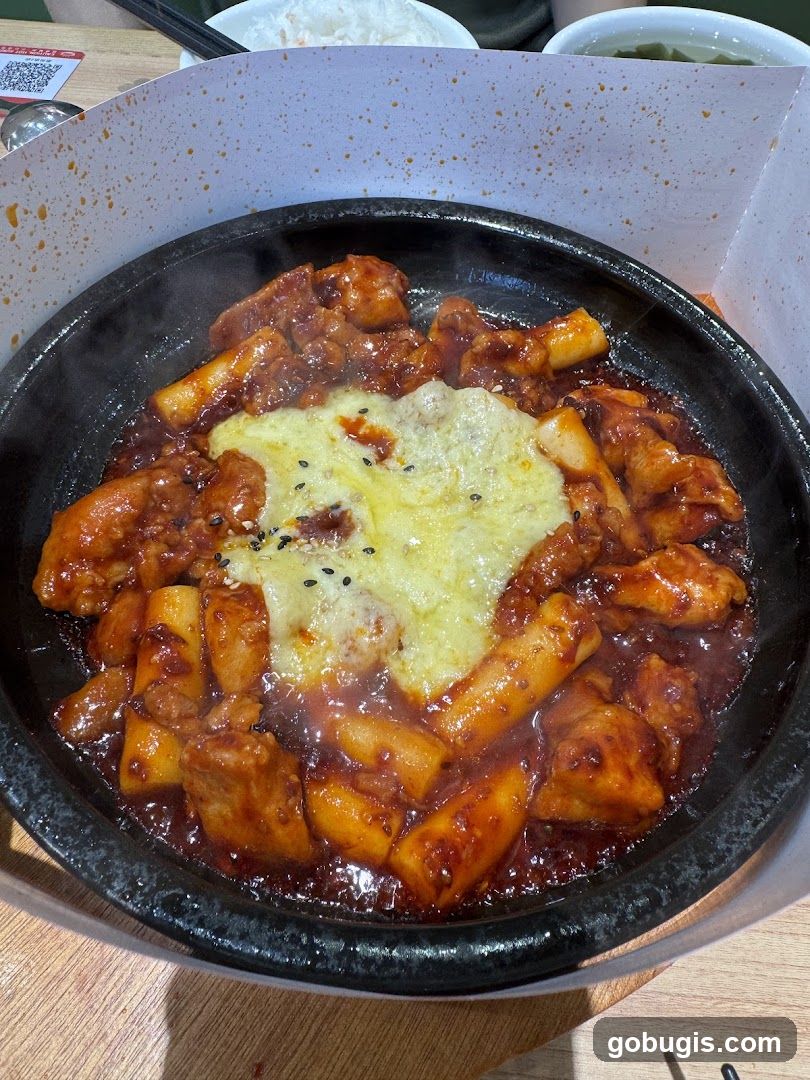 Spicy Chicken and Rice Cakes with Cheese