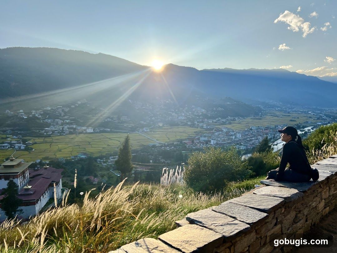 Woman Enjoying a Scenic View at Sunset