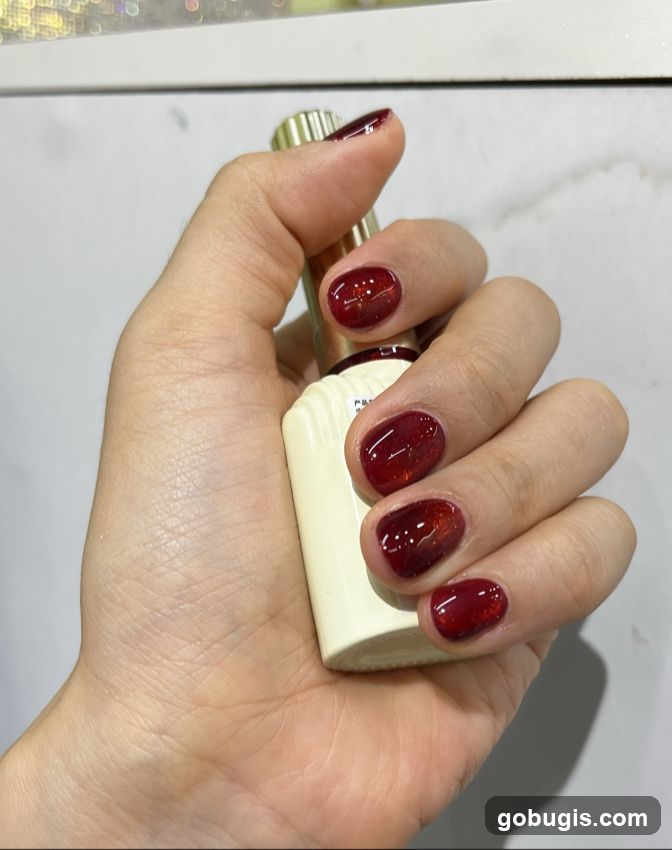 Hand with Red Nail Polish