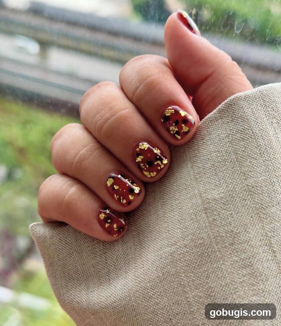 Nails with Tortoiseshell and Gold Leaf Design