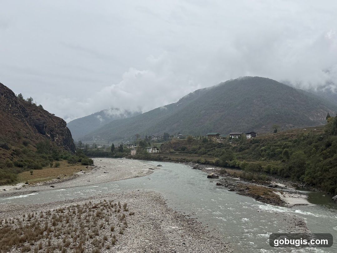 River valley with mountains and village