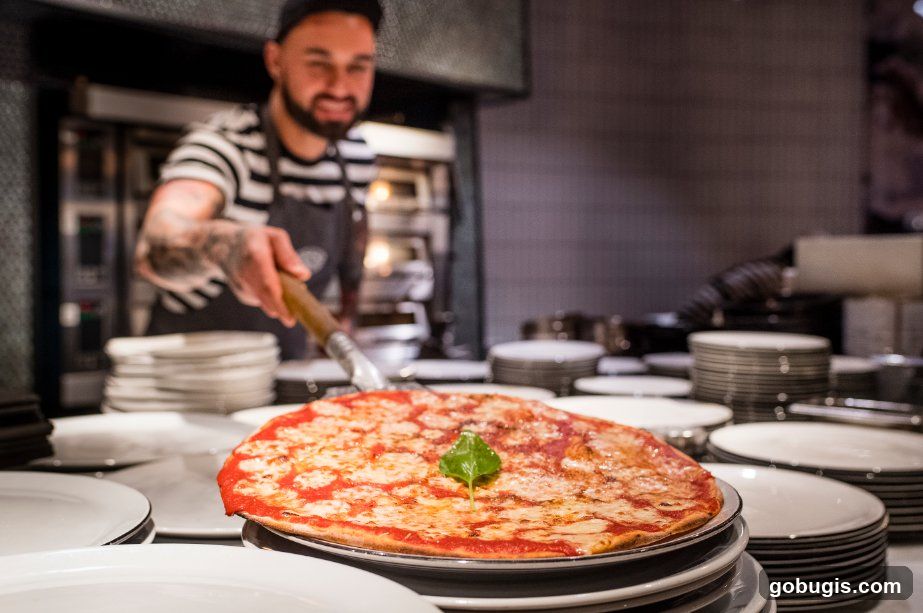 Pizza being served