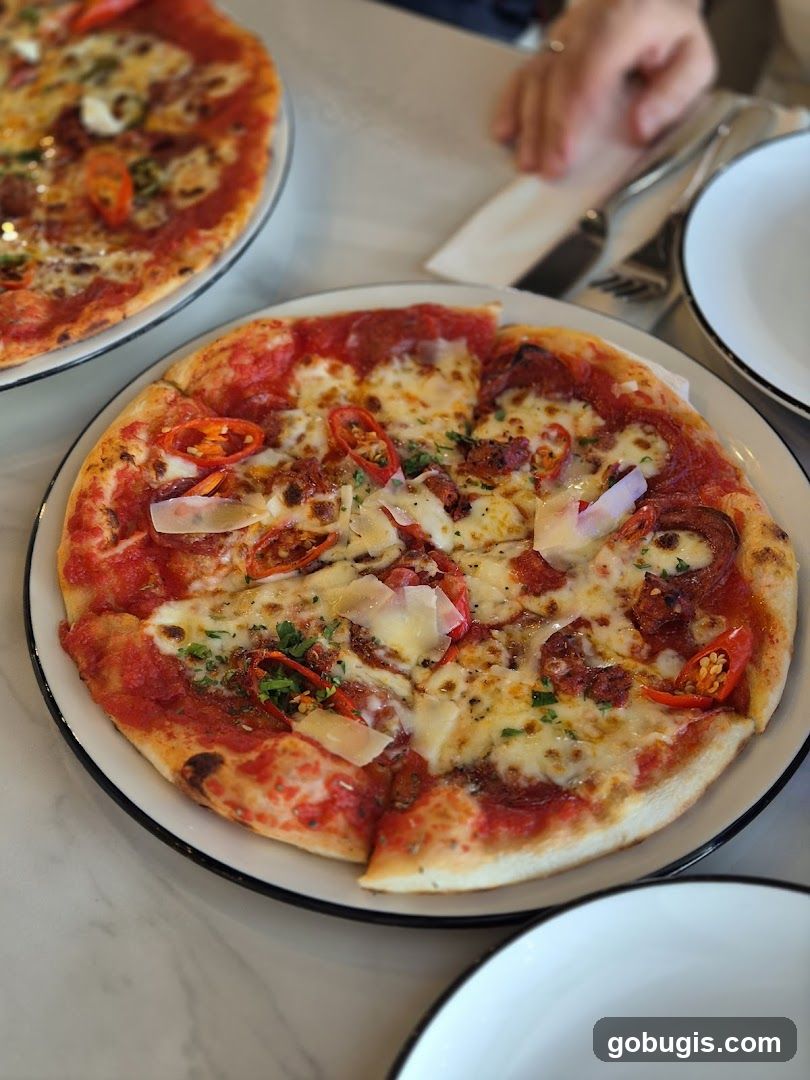 Two Pizzas on a Table