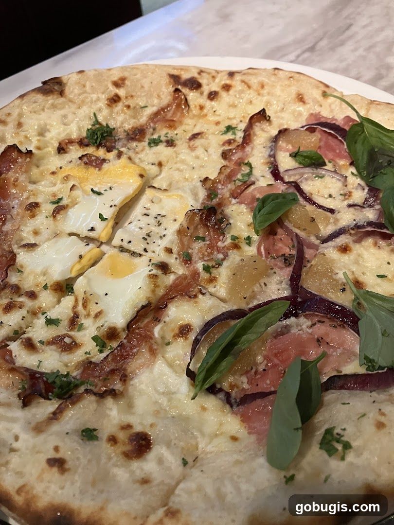Pizza with Egg and Prosciutto