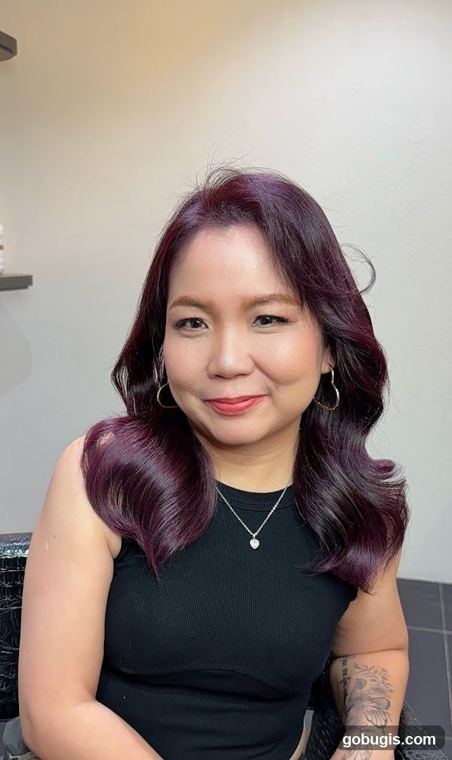 Woman with dark purple hair