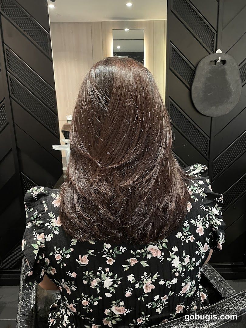 Woman with layered brown hair