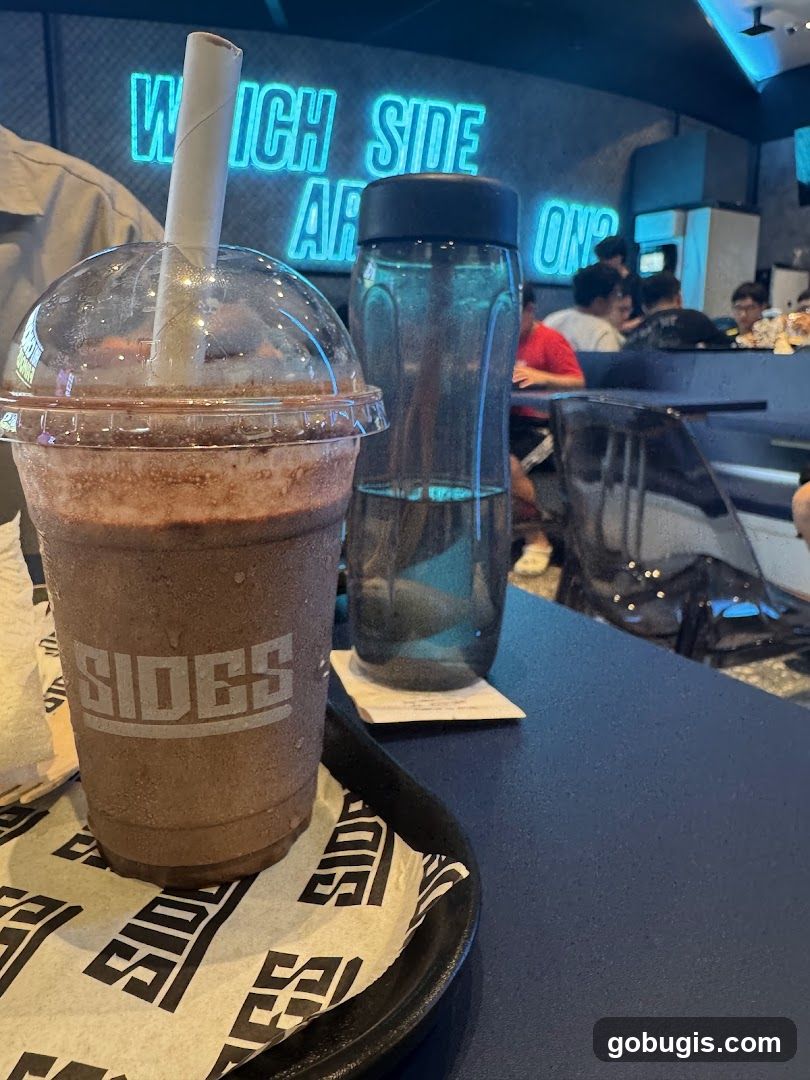 Chocolate Drink and Water Bottle on Table