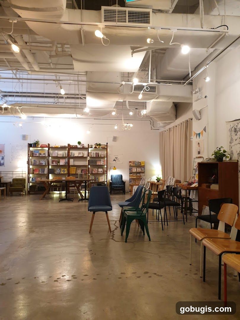 Interior of a cafe with bookshelves and seating