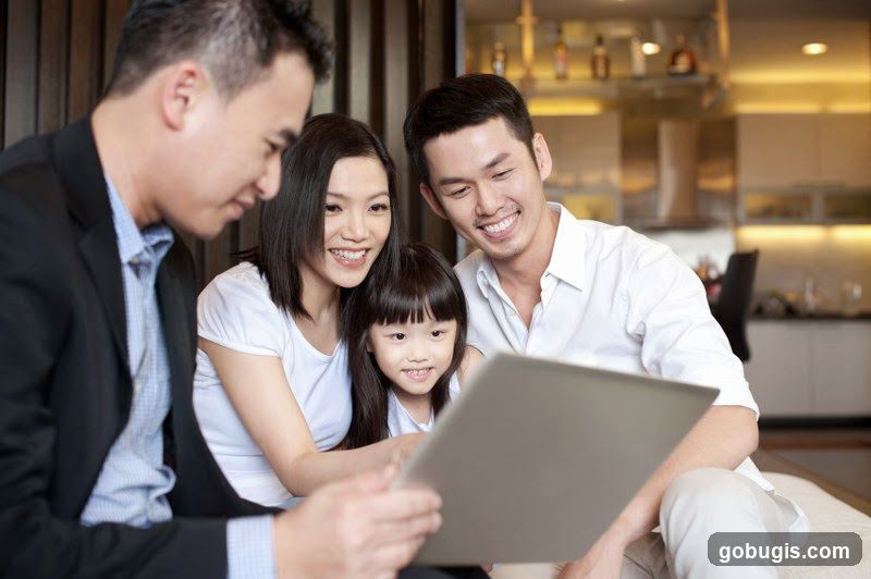 Family looking at a tablet