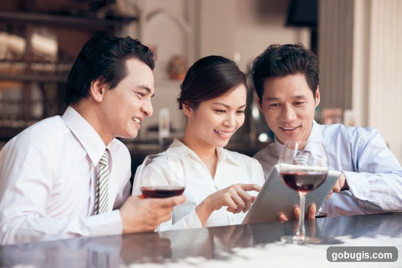 Colleagues looking at a tablet