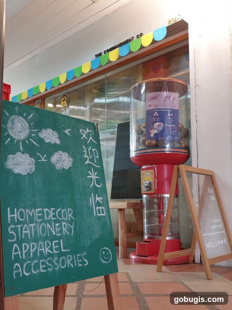 Storefront with chalkboards and gumball machine