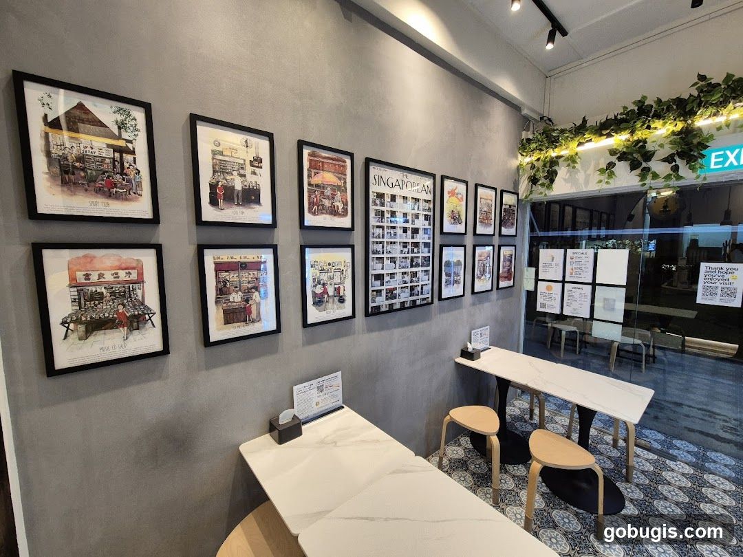 Interior of a cafe with artwork and seating