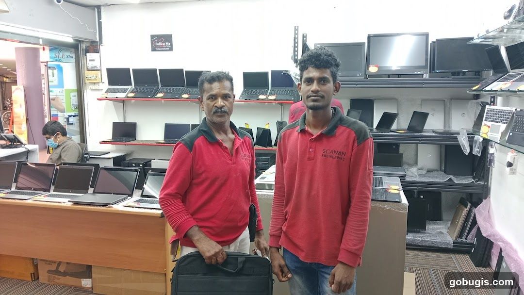 Two men in a computer store