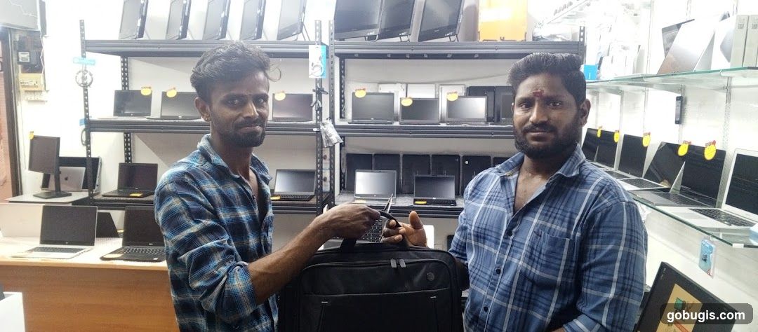 Two men in a computer store