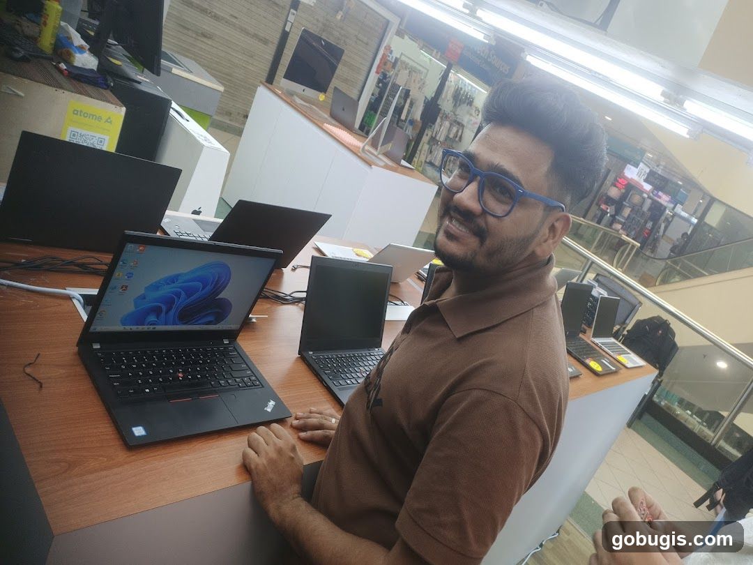 Man in a store with laptops