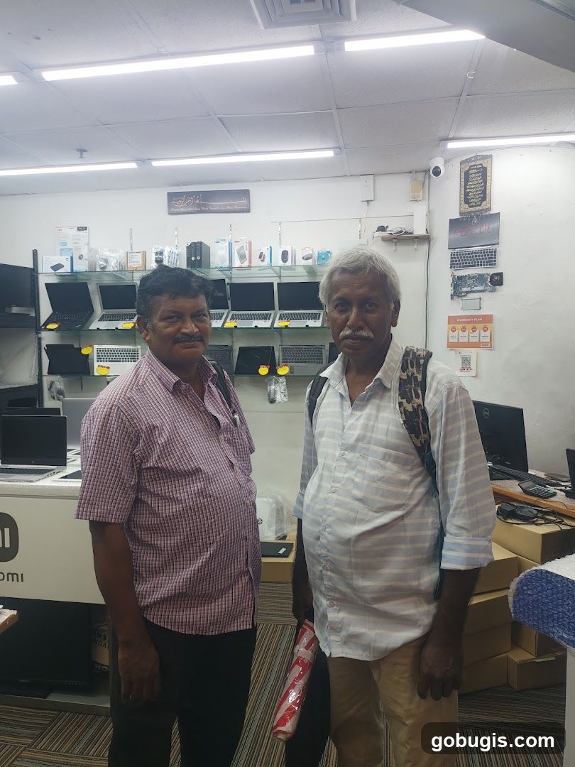 Two men in an electronics store