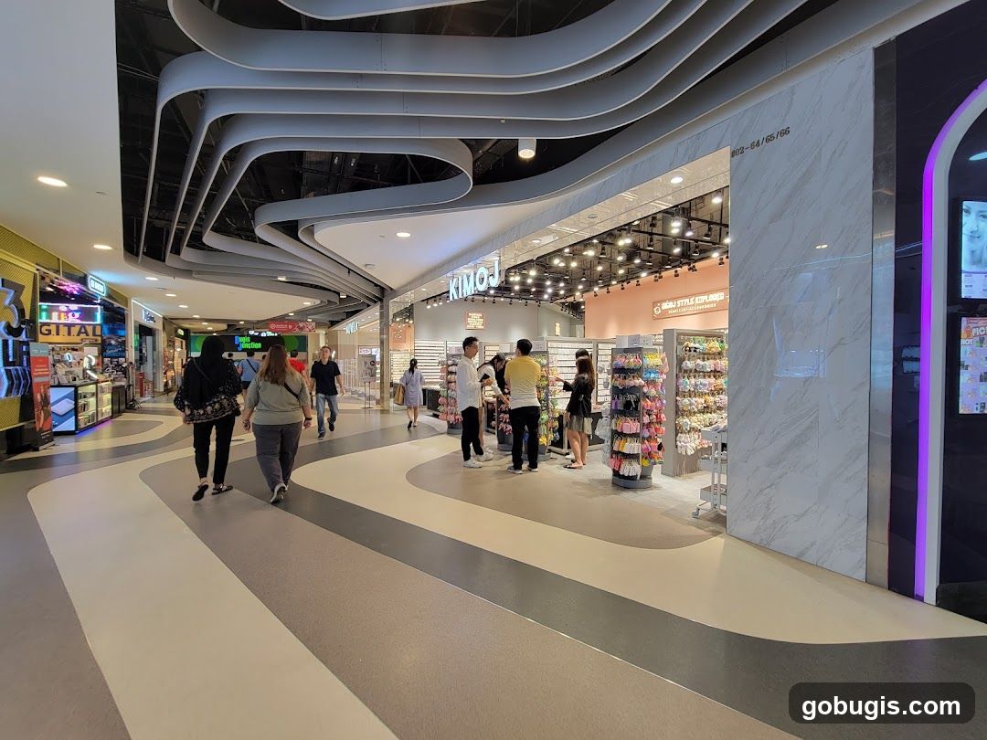 Shopping mall interior with various shops