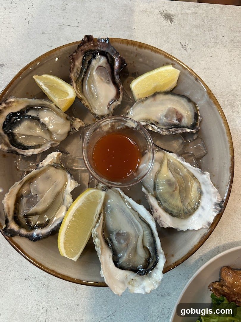 Oysters with Lemon and Sauce
