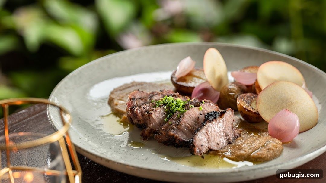 Sliced grilled meat with roasted vegetables