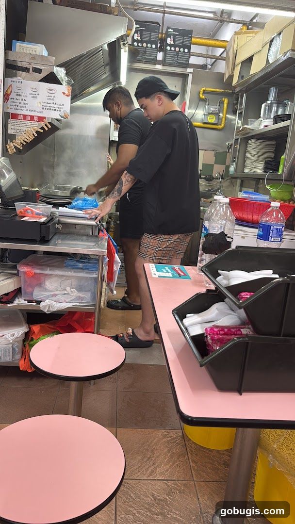 Kitchen Staff Preparing Food