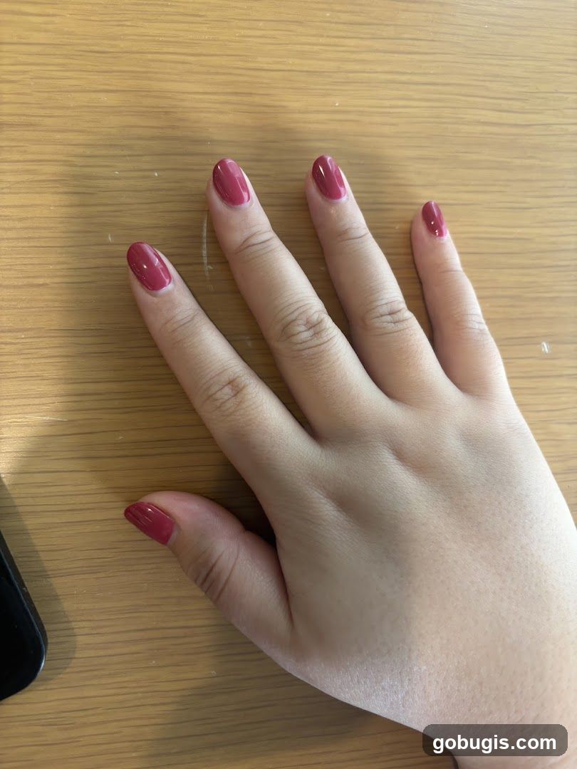 Hand with Red Nail Polish