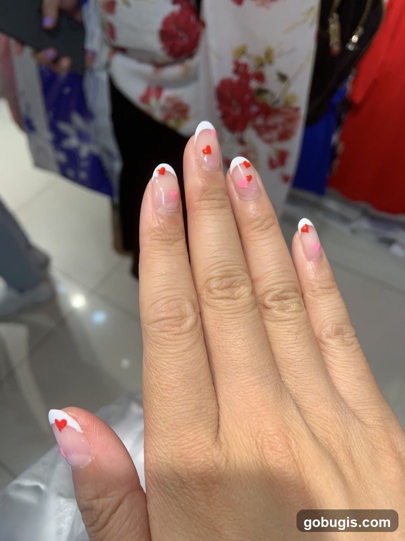 French Manicure with Heart Accents