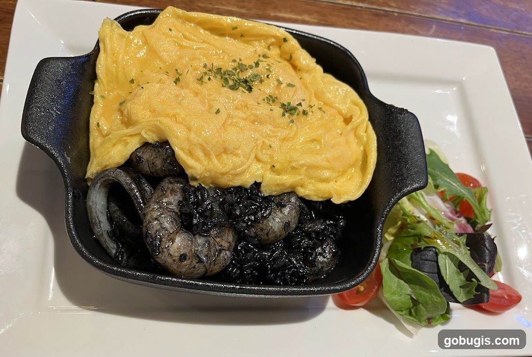 Squid Ink Risotto with Omelette