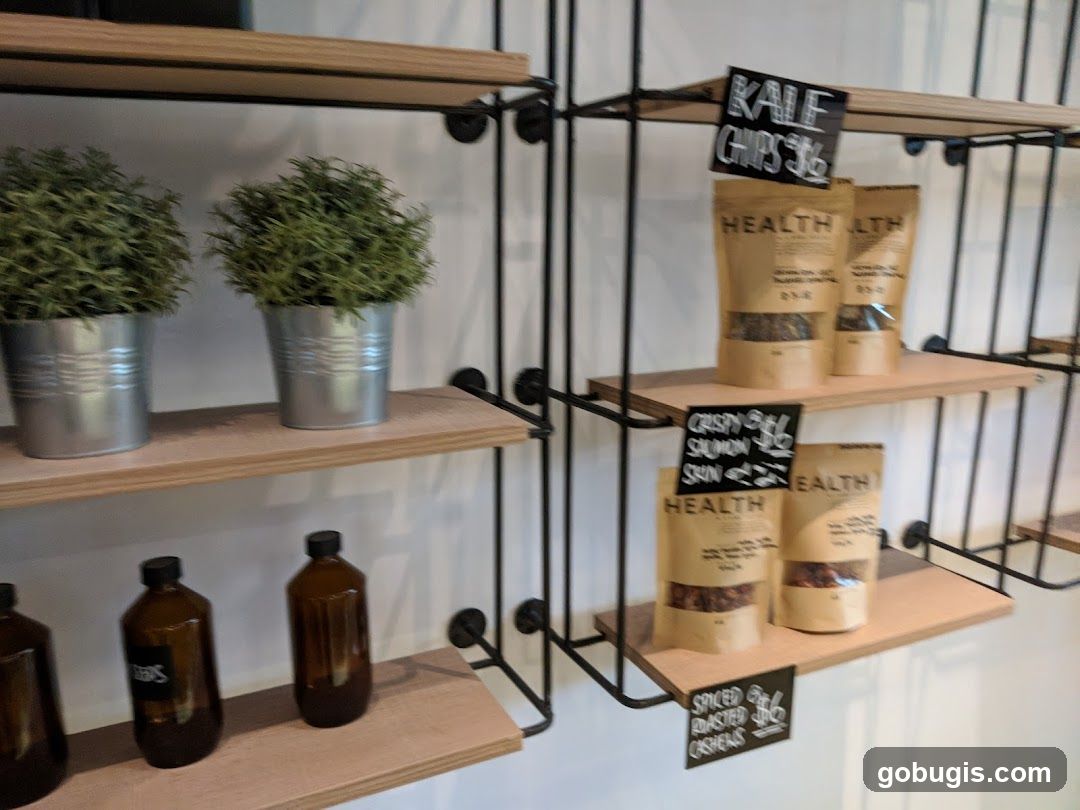 Shelving with packaged goods and plants