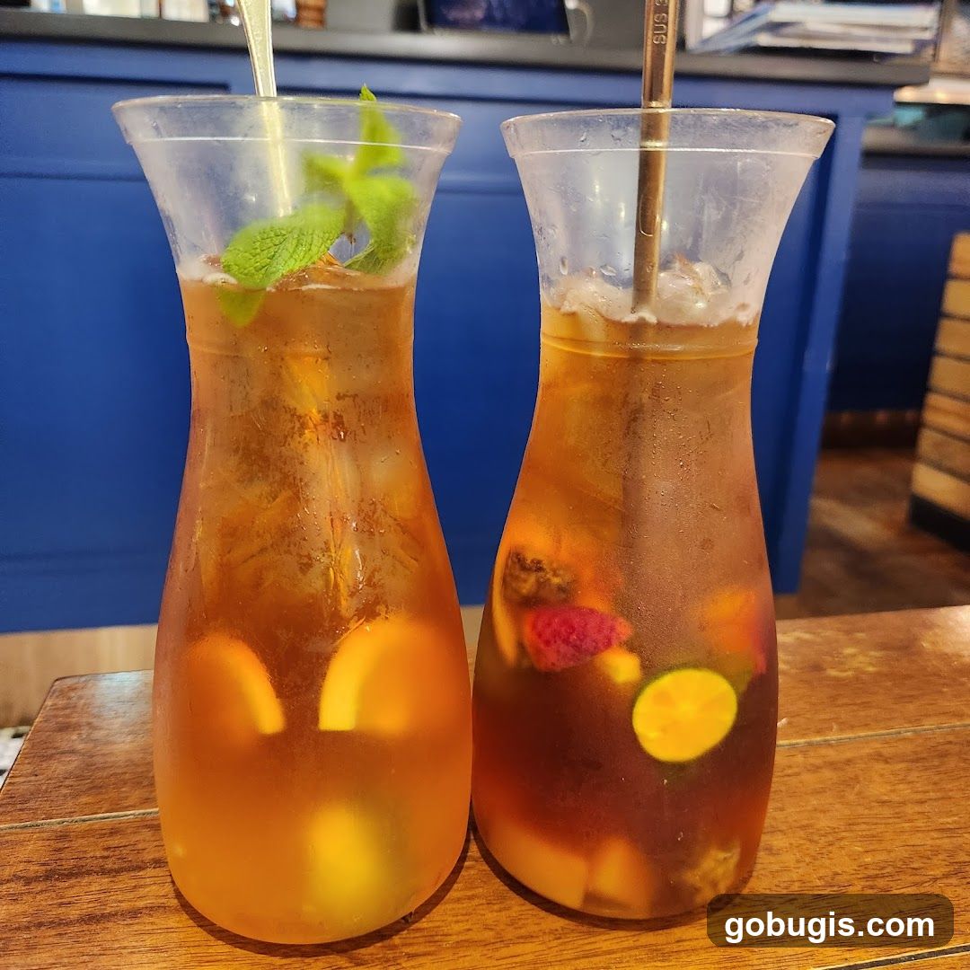 Two pitchers of iced tea