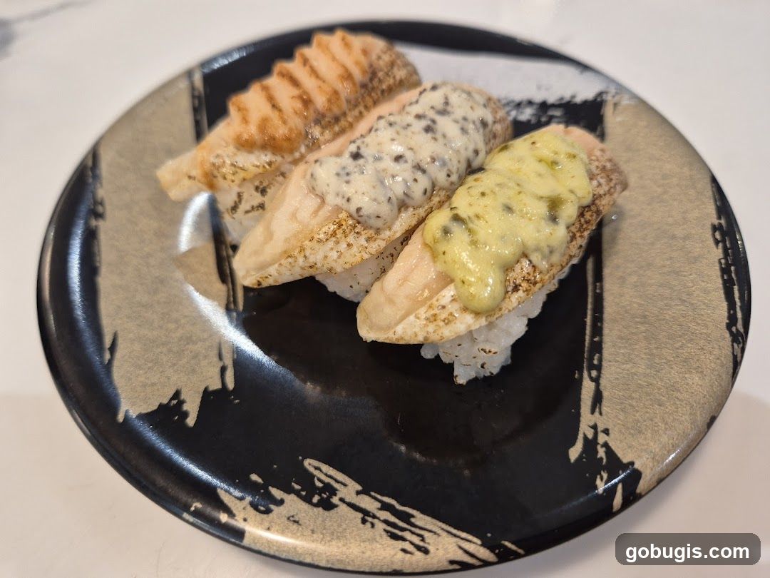 Three pieces of sushi on a plate