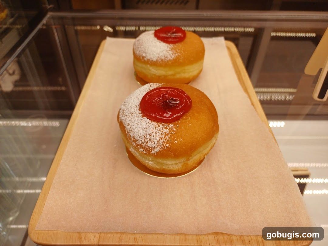 Donuts with Jam and Powdered Sugar