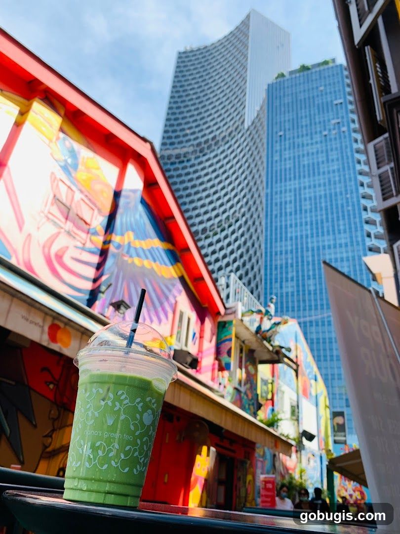 Green Tea Drink with Colorful Buildings