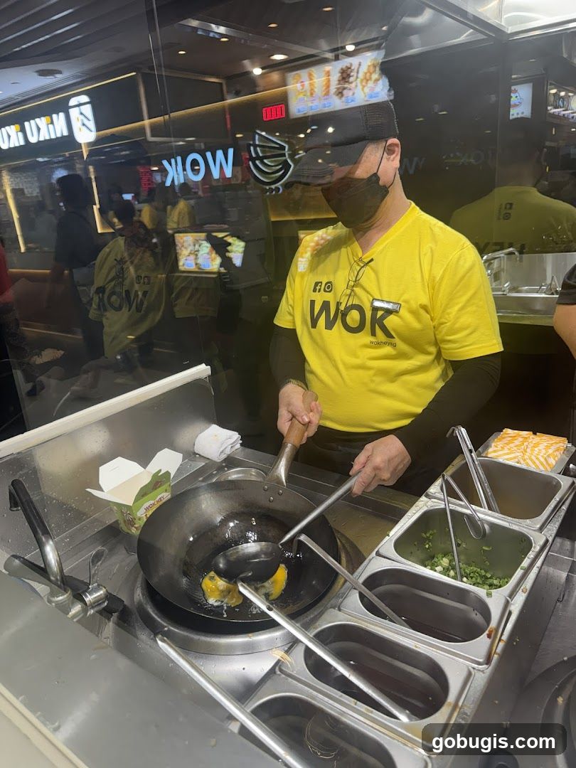 Chef cooking in a wok