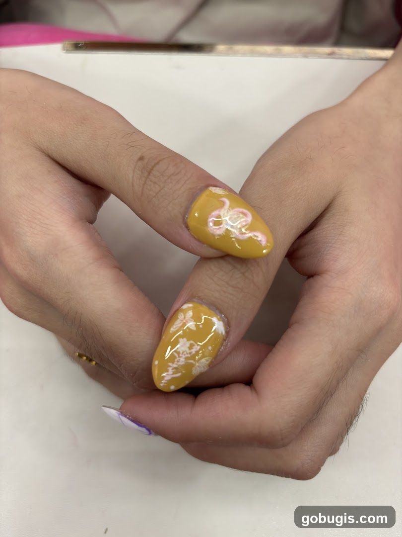 Yellow Nails with White Designs