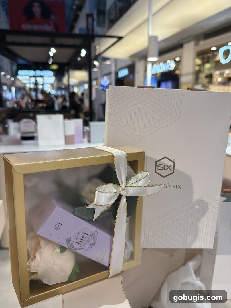 Gift Box with Perfume and Flowers