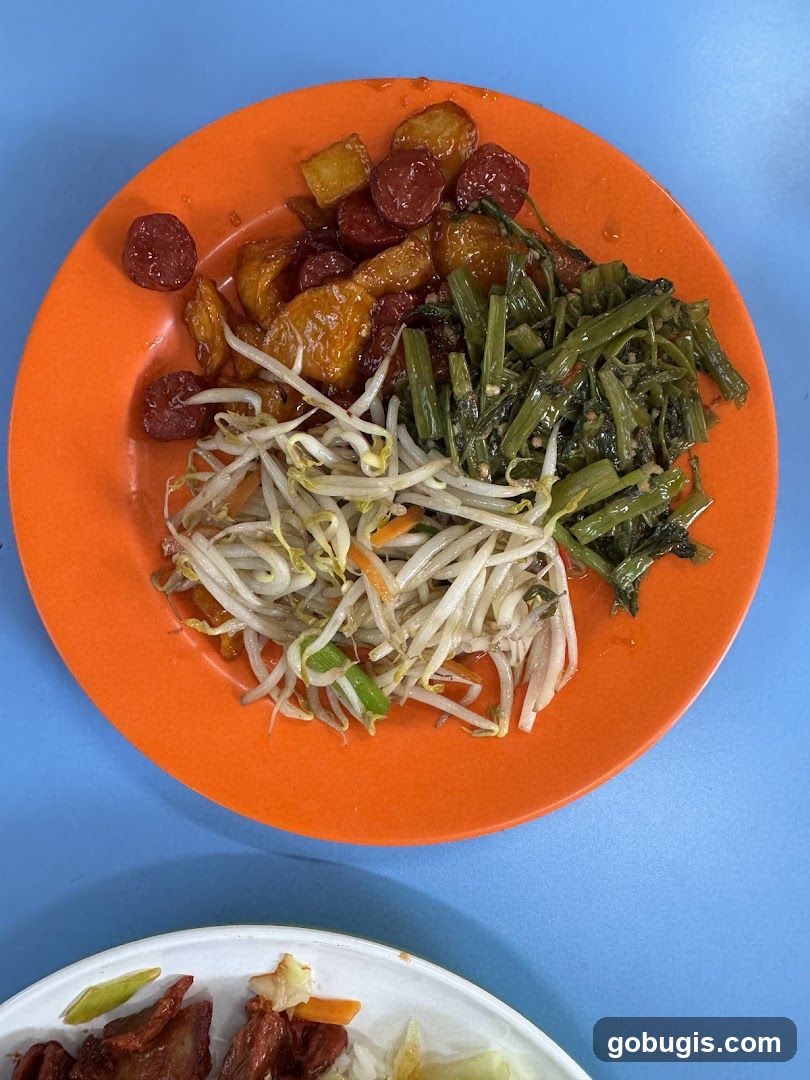 Plate of Stir-Fried Vegetables and Sausage