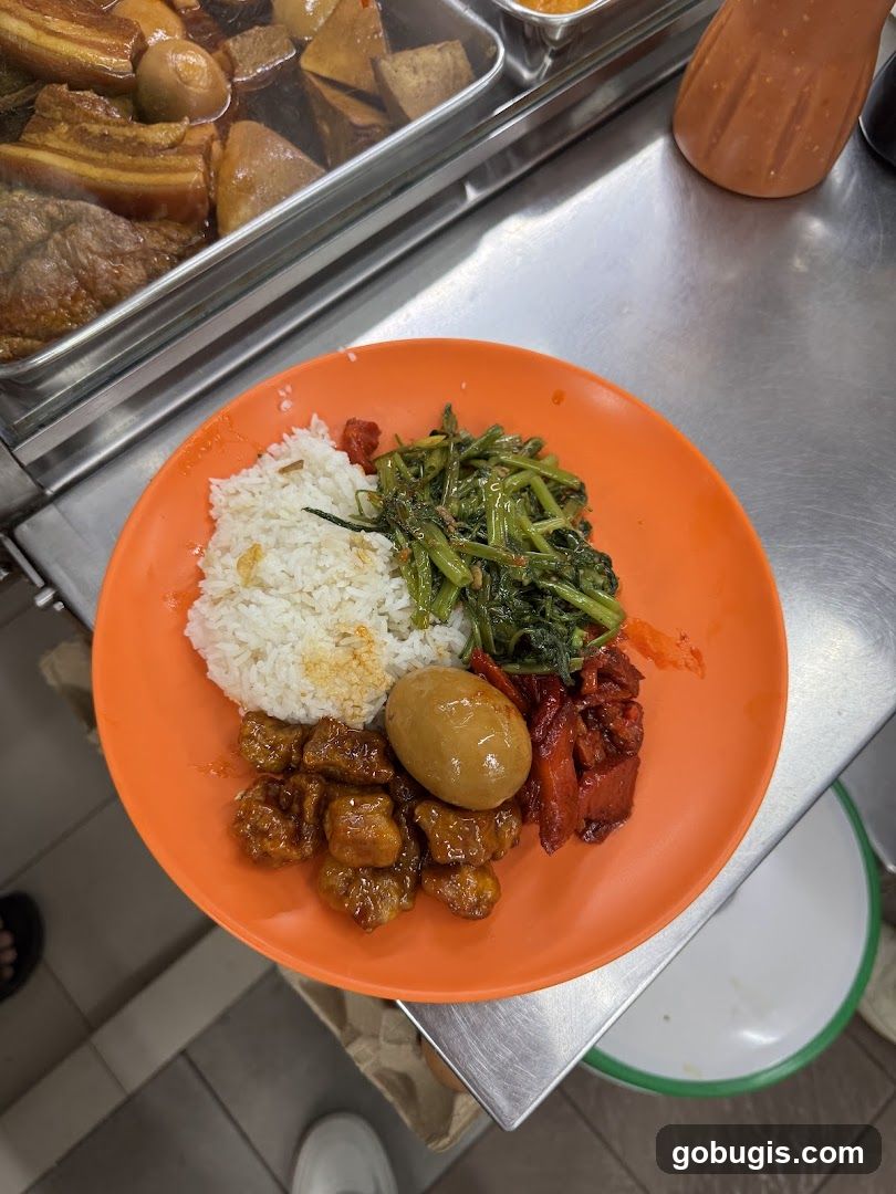 Plate of food with rice and various toppings