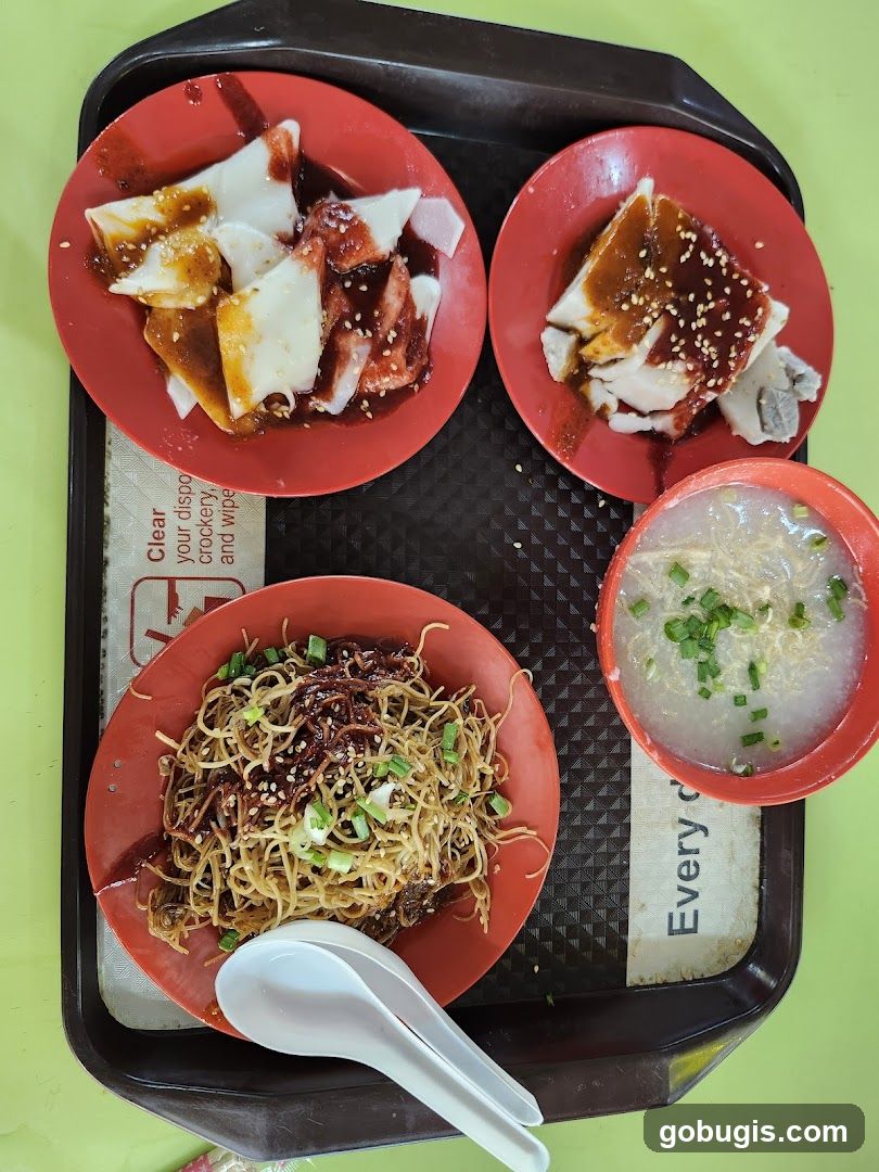 Food Tray with Noodles, Rice Rolls, and Congee